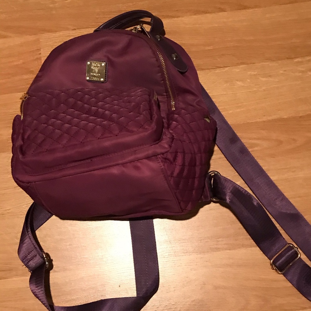 Purple woman’s backpack